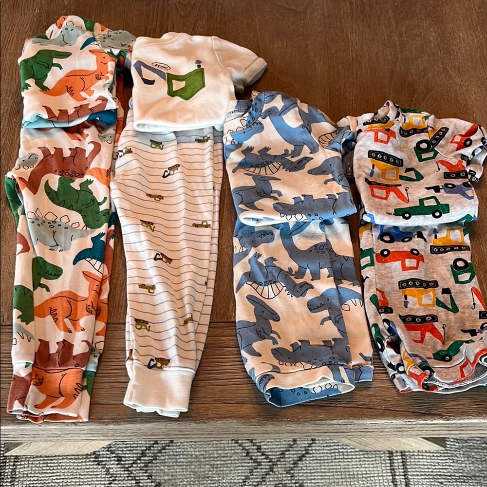 4 pair Pajamas in EUC Colorful Baby Dinosaur and Vehicle Pajama Set